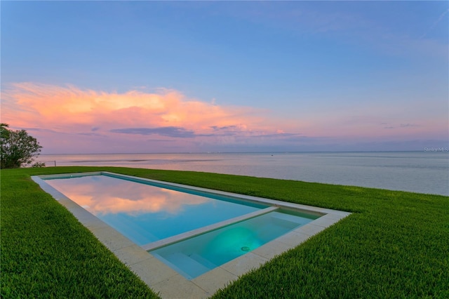 218 Colony Point Rd S, Saint Petersburg, FL 33705 - view of pool featuring a water view, a lawn, and a pool with connected hot tub