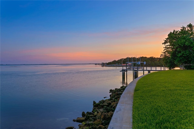 218 Colony Point Rd S, Saint Petersburg, FL 33705 - dock area featuring boat lift, a water view, and a yard