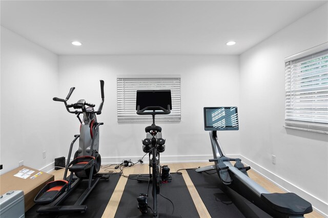 218 Colony Point Rd S, Saint Petersburg, FL 33705 - exercise room with recessed lighting, wood finished floors, and baseboards