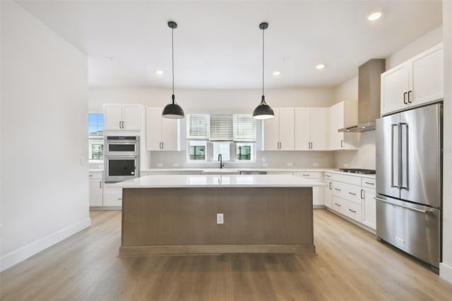 7240 Sutton Ln, Sarasota, FL 34240 - kitchen featuring stainless steel appliances, a sink, plenty of natural light, a center island, and recessed lighting