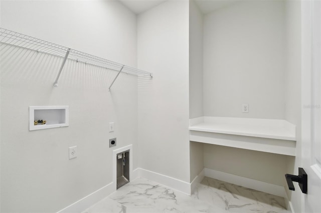 7240 Sutton Ln, Sarasota, FL 34240 - laundry room featuring electric dryer hookup, washer hookup, baseboards, and marble finish floors