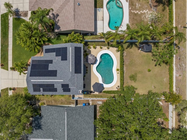 drone / aerial view of a pool