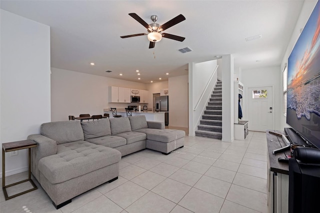 6542 95th Pl N, Pinellas Park, FL 33782 - living room with stairs, a ceiling fan, light tile patterned floors, baseboards, and recessed lighting