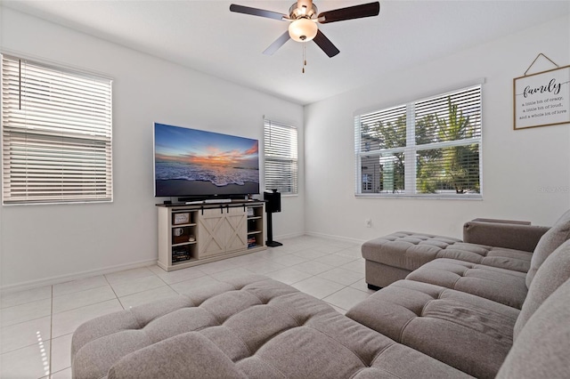 6542 95th Pl N, Pinellas Park, FL 33782 - tiled living area with ceiling fan and baseboards