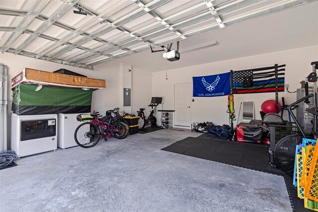 6542 95th Pl N, Pinellas Park, FL 33782 - garage with electric panel, washer / clothes dryer, and a garage door opener