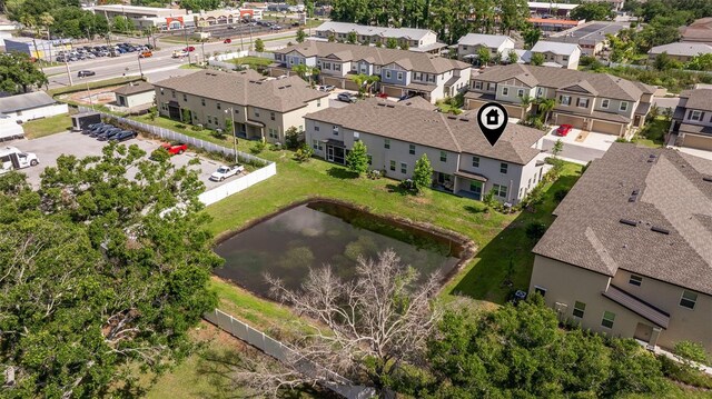 6542 95th Pl N, Pinellas Park, FL 33782 - aerial perspective of suburban area featuring a large body of water