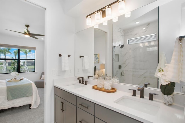 16117 Rosemallow Ln, Alva, FL 33920 - ensuite bathroom with a marble finish shower, ceiling fan, and double vanity