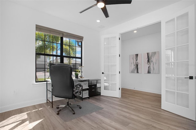 16117 Rosemallow Ln, Alva, FL 33920 - office with french doors, wood finished floors, ceiling fan, baseboards, and recessed lighting