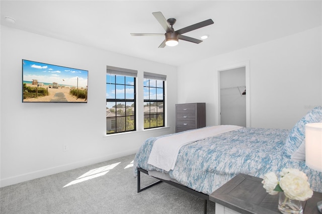 16117 Rosemallow Ln, Alva, FL 33920 - bedroom featuring carpet floors, baseboards, ceiling fan, and a walk in closet