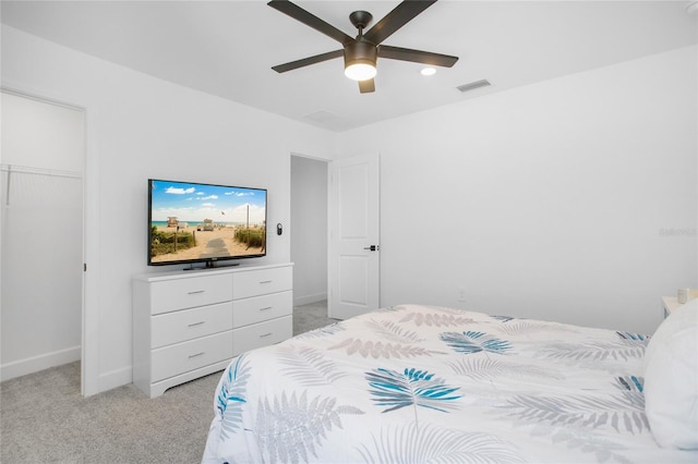 16117 Rosemallow Ln, Alva, FL 33920 - bedroom featuring light carpet, a closet, ceiling fan, baseboards, and a spacious closet