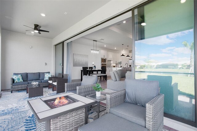 16117 Rosemallow Ln, Alva, FL 33920 - view of patio with an outdoor living space with a fire pit, ceiling fan, and a sink