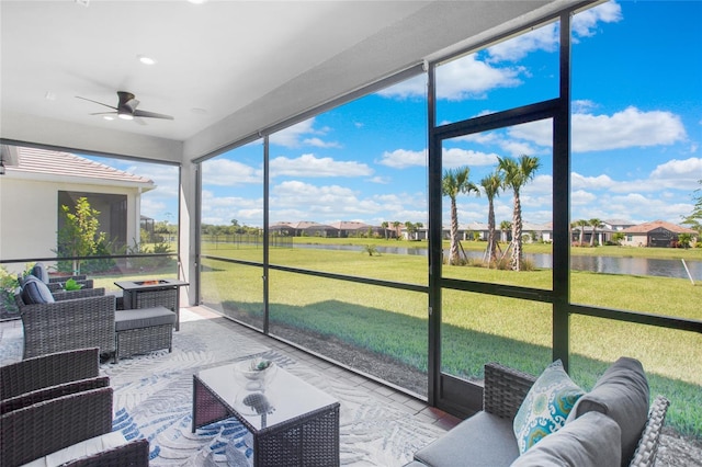16117 Rosemallow Ln, Alva, FL 33920 - sunroom with a ceiling fan, a water view, a residential view, and an outdoor hangout area