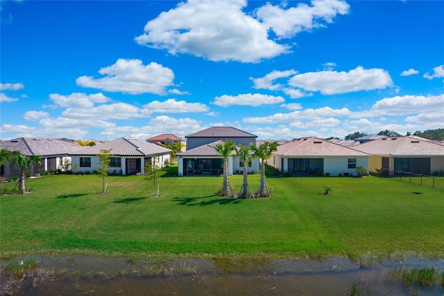 16117 Rosemallow Ln, Alva, FL 33920 - rear view of property featuring a tiled roof and stucco siding