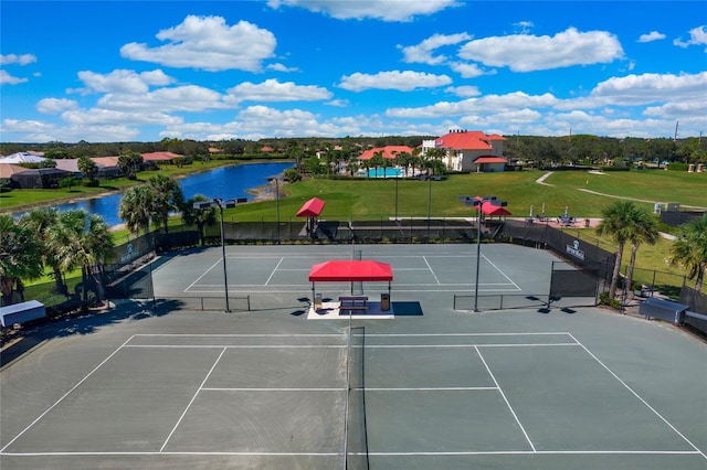 16117 Rosemallow Ln, Alva, FL 33920 - view of tennis court with a water view and fence