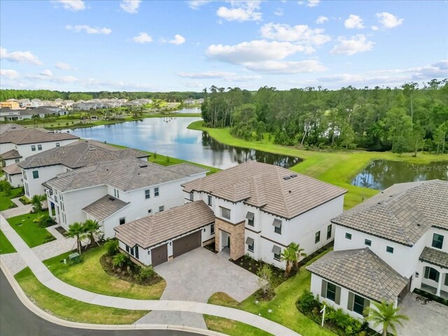 33750 Ocean Spray Ln, Wesley Chapel, FL 33543 - aerial perspective of suburban area featuring a nearby body of water