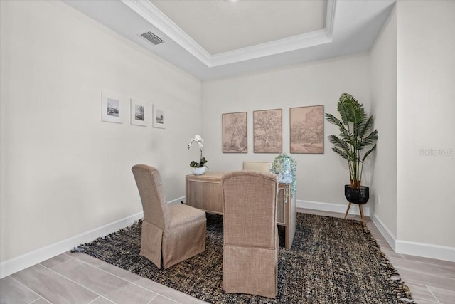 33750 Ocean Spray Ln, Wesley Chapel, FL 33543 - dining room with ornamental molding, a tray ceiling, and baseboards