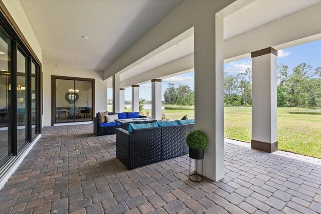 33750 Ocean Spray Ln, Wesley Chapel, FL 33543 - view of patio featuring an outdoor hangout area