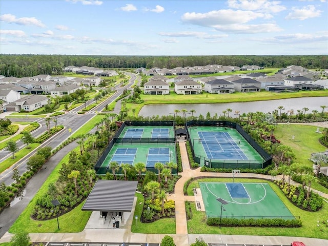 33750 Ocean Spray Ln, Wesley Chapel, FL 33543 - aerial perspective of suburban area with a large body of water