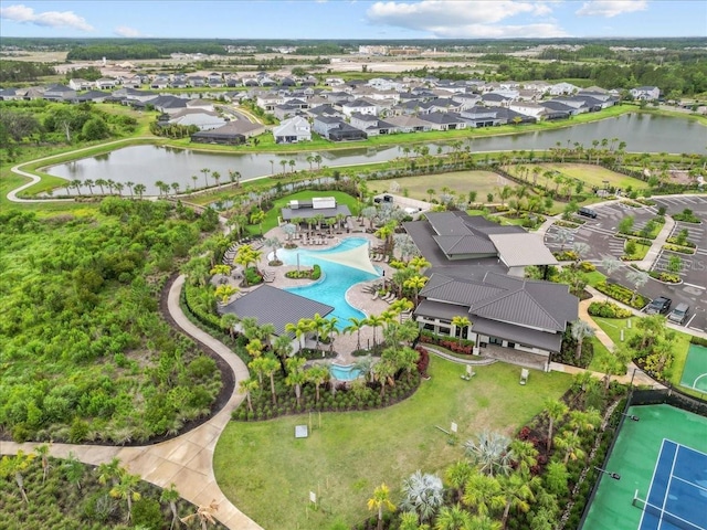 33750 Ocean Spray Ln, Wesley Chapel, FL 33543 - drone / aerial view of a nearby body of water and a pool area