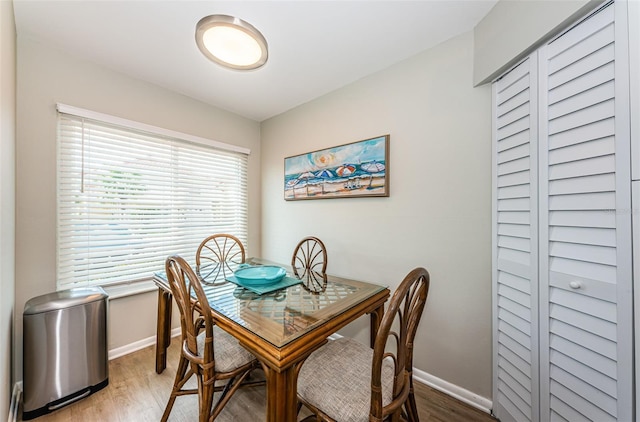 6151 Bahia Del Mar Blvd Unit 126, Saint Petersburg, FL 33715 - dining room with light wood finished floors, baseboards, and an office area