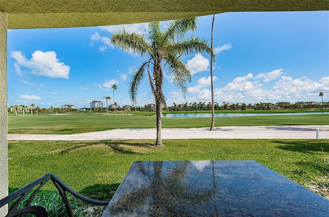 6151 Bahia Del Mar Blvd Unit 126, Saint Petersburg, FL 33715 - view of grassy yard featuring a water view and view of golf course