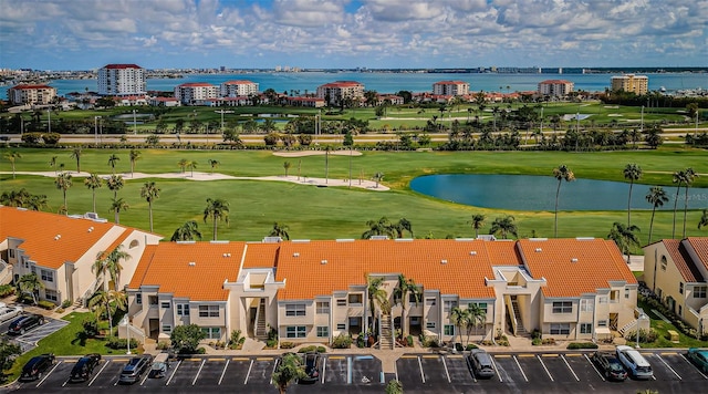 6151 Bahia Del Mar Blvd Unit 126, Saint Petersburg, FL 33715 - drone / aerial view of a large body of water and a golf course