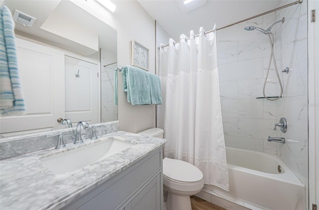 6151 Bahia Del Mar Blvd Unit 126, Saint Petersburg, FL 33715 - bathroom with toilet, shower / tub combo, and vanity