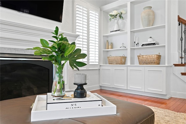 2936 W Knights Ave Unit A, Tampa, FL 33611 - detailed view of wood finished floors, built in features, and baseboards