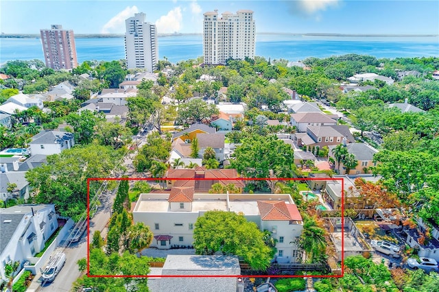 2936 W Knights Ave Unit A, Tampa, FL 33611 - aerial perspective of suburban area with property parcel outlined and a nearby body of water