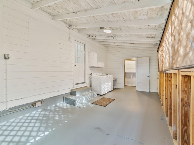 3305 10th Ave N, Saint Petersburg, FL 33713 - interior space with independent washer and dryer, finished concrete flooring, beam ceiling, wood ceiling, and wooden walls