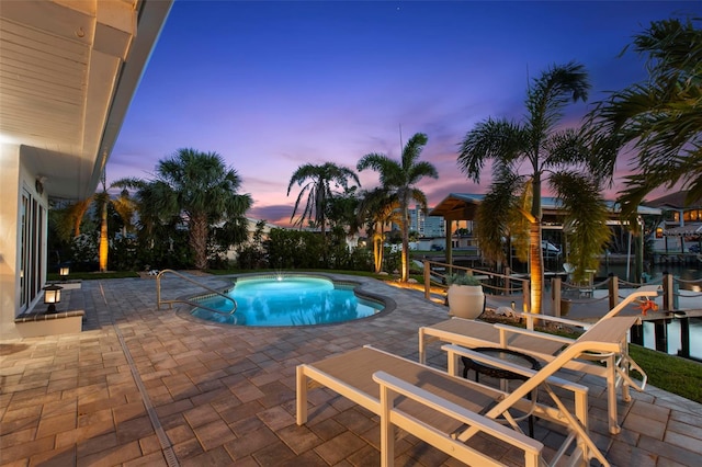 106 Midway Is, Clearwater Beach, FL 33767 - swimming pool with a patio