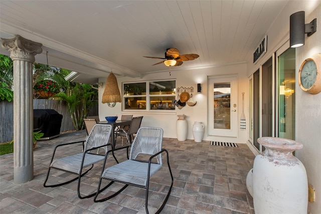 106 Midway Is, Clearwater Beach, FL 33767 - view of patio / terrace with outdoor dining space and ceiling fan
