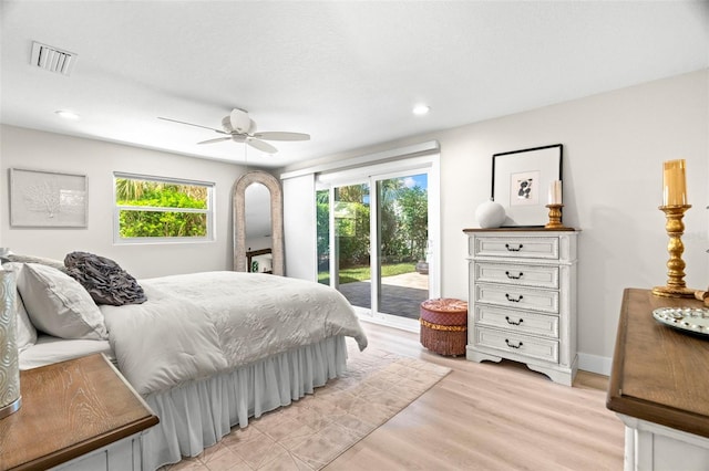 106 Midway Is, Clearwater Beach, FL 33767 - bedroom with access to outside, light wood-type flooring, recessed lighting, and a ceiling fan