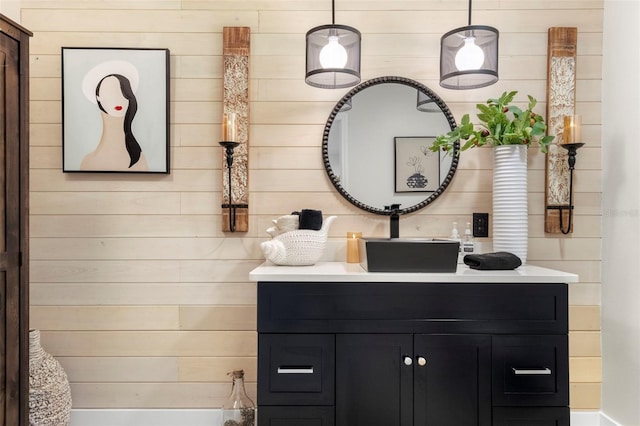 106 Midway Is, Clearwater Beach, FL 33767 - full bath with vanity, wood walls, and a tub to relax in