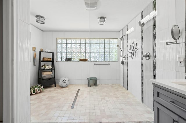106 Midway Is, Clearwater Beach, FL 33767 - full bath featuring a tile shower and vanity