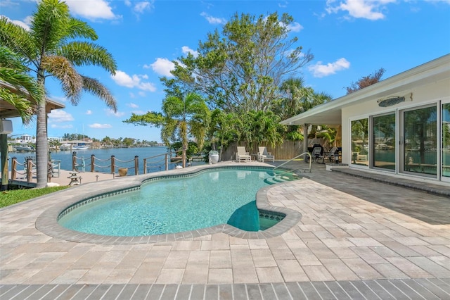 106 Midway Is, Clearwater Beach, FL 33767 - view of swimming pool featuring a patio area and a water view