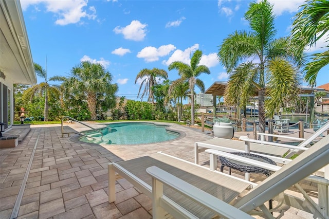 106 Midway Is, Clearwater Beach, FL 33767 - swimming pool with a patio
