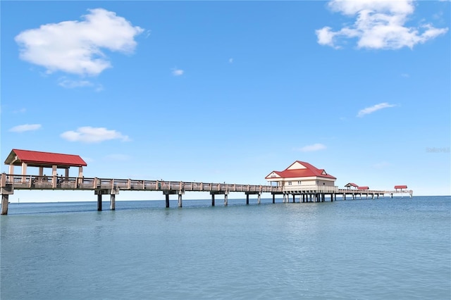 106 Midway Is, Clearwater Beach, FL 33767 - dock featuring a pier and a water view
