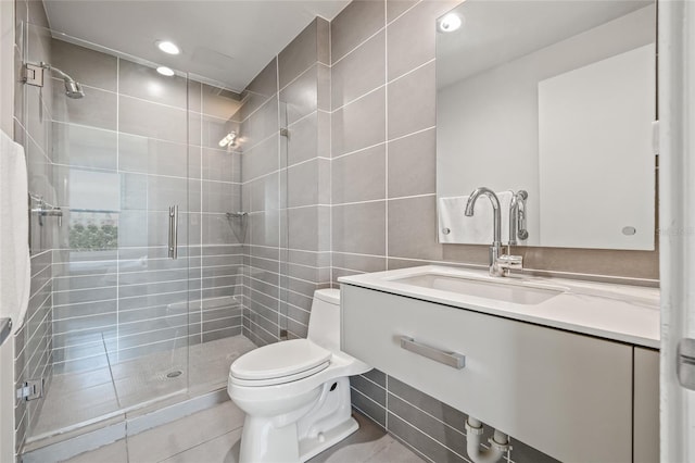 full bathroom featuring toilet, a stall shower, tile walls, tile patterned flooring, and recessed lighting
