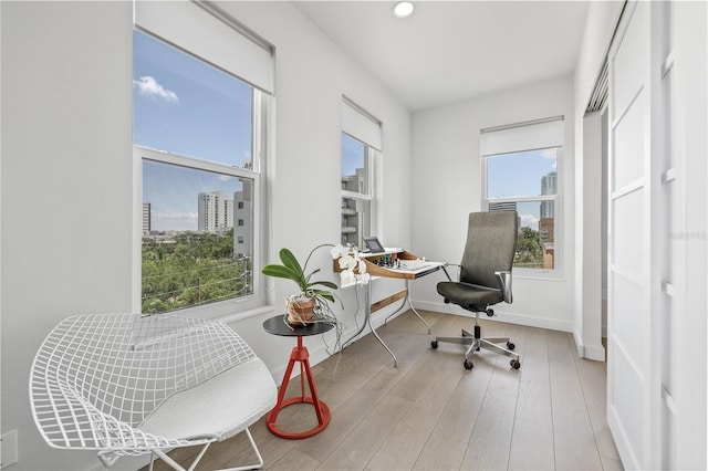 205 5th Ave N Unit 501, Saint Petersburg, FL 33701 - office area featuring wood finished floors, baseboards, a city view, and recessed lighting