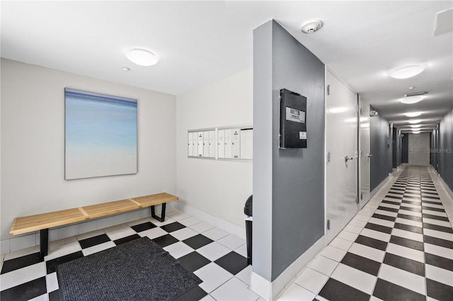 205 5th Ave N Unit 501, Saint Petersburg, FL 33701 - hall with light flooring, baseboards, and mail area