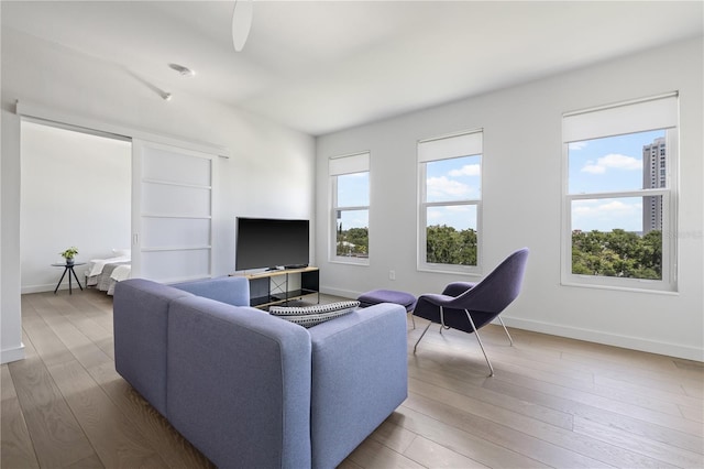 205 5th Ave N Unit 501, Saint Petersburg, FL 33701 - living area with baseboards and wood finished floors