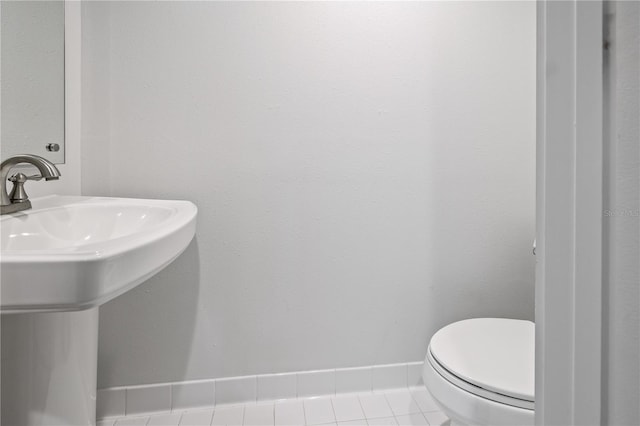 205 5th Ave N Unit 501, Saint Petersburg, FL 33701 - bathroom with a sink, toilet, and baseboards