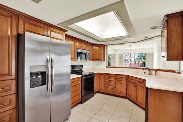 14561 El Paseo Dr, Seminole, FL 33776 - kitchen with stainless steel appliances, a sink, brown cabinets, light tile patterned flooring, and light countertops