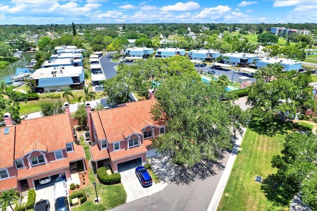 14561 El Paseo Dr, Seminole, FL 33776 - drone / aerial view of a tree filled landscape