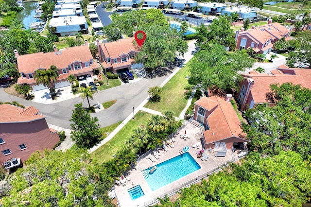 14561 El Paseo Dr, Seminole, FL 33776 - aerial view of residential area featuring a pool