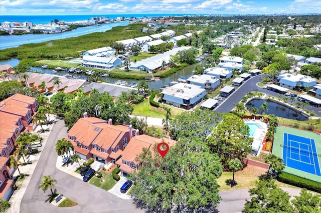14561 El Paseo Dr, Seminole, FL 33776 - aerial view of residential area with a nearby body of water