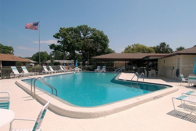 1126 Tarridon Ct, Dunedin, FL 34698 - community pool featuring fence and a patio