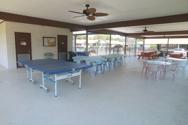 1126 Tarridon Ct, Dunedin, FL 34698 - view of patio / terrace with a ceiling fan, outdoor dining space, and fence