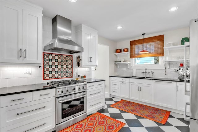 221 13th Ave NE, Saint Petersburg, FL 33701 - kitchen featuring open shelves, high end stainless steel range, wall chimney range hood, a sink, and dark floors